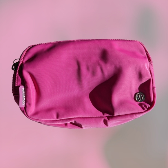 lululemon athletica Handbags - Lululemon Athletica Sonic Pink Beltbag